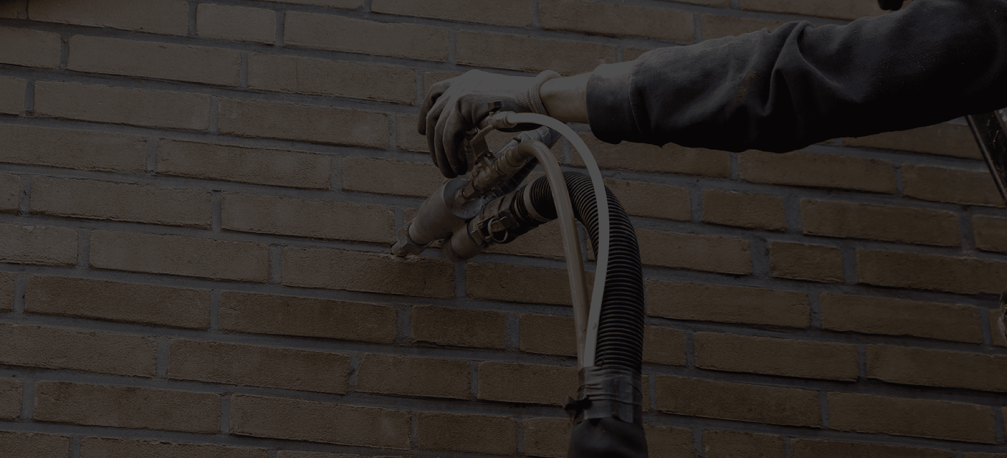 Cavity wall insulation header